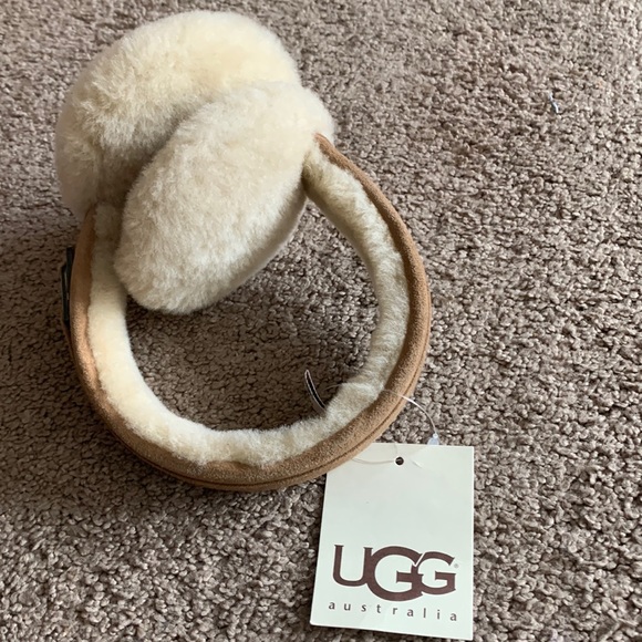 UGG Accessories - Brand New with tags Ugg Earmuffs. Color is Carmel Suede and Cream